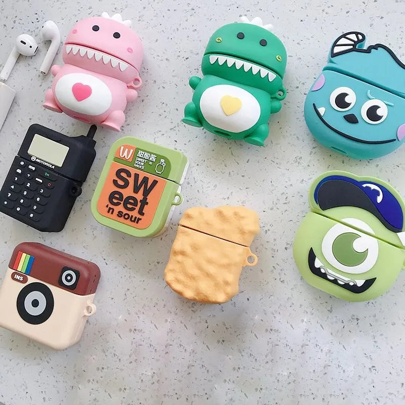 Green silicone case for AirPods 1/2 with a cartoon animal design on a white background.
