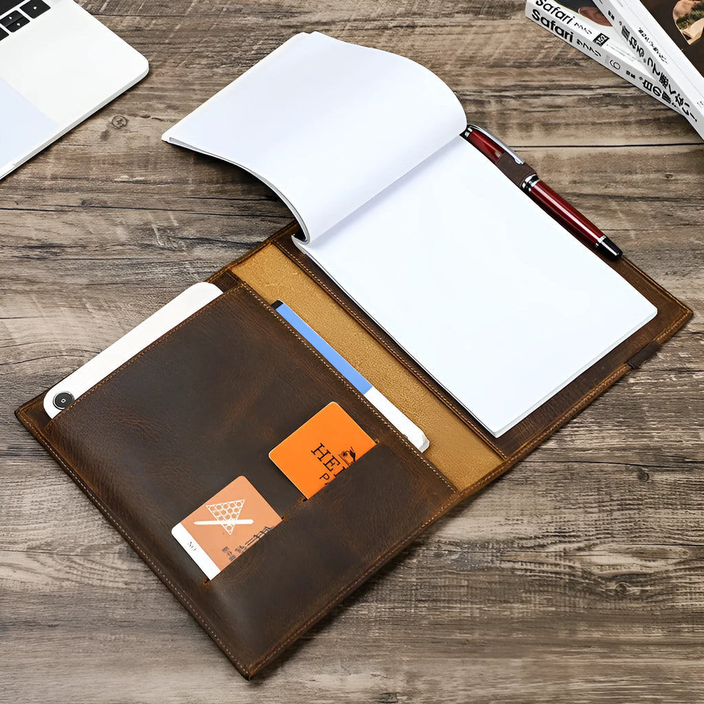 Brown Crazy Horse leather protective sleeve for an A5 paper notebook.