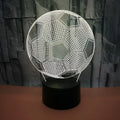3D football-shaped night light with colour-changing LED effects on a black ABS base.