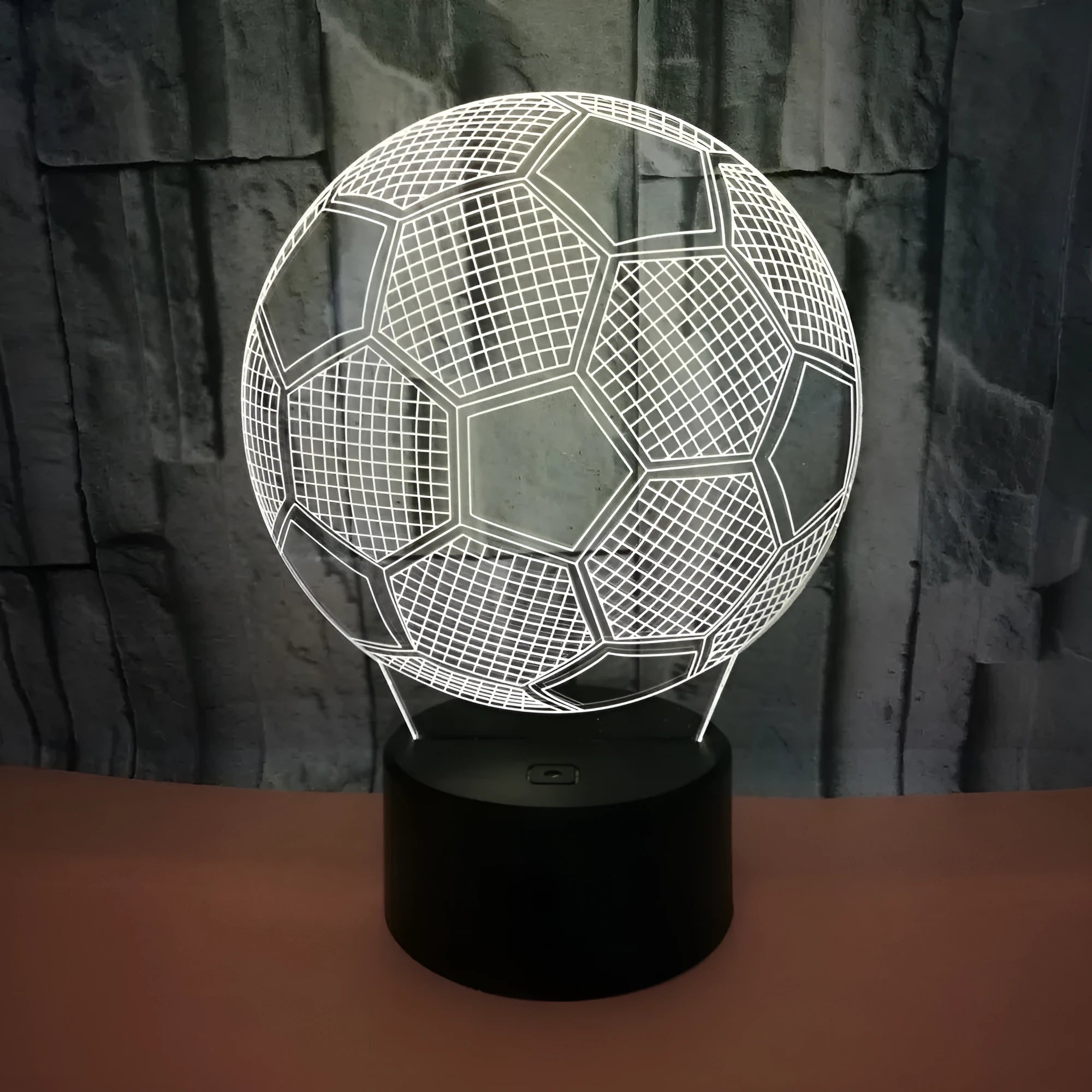3D football-shaped night light with colour-changing LED effects on a black ABS base.