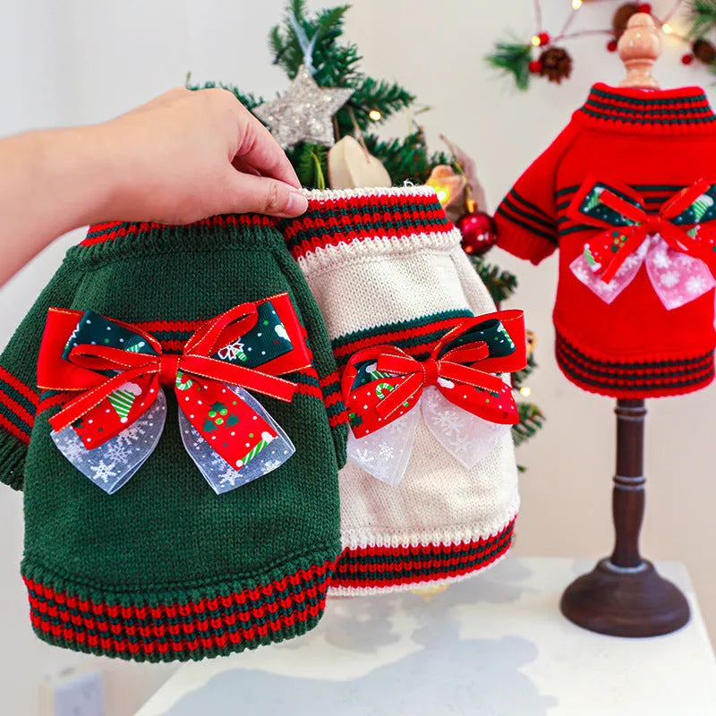 A red polyester Christmas jumper for a dog, shown on a mannequin, with sizes ranging from XS to XL.