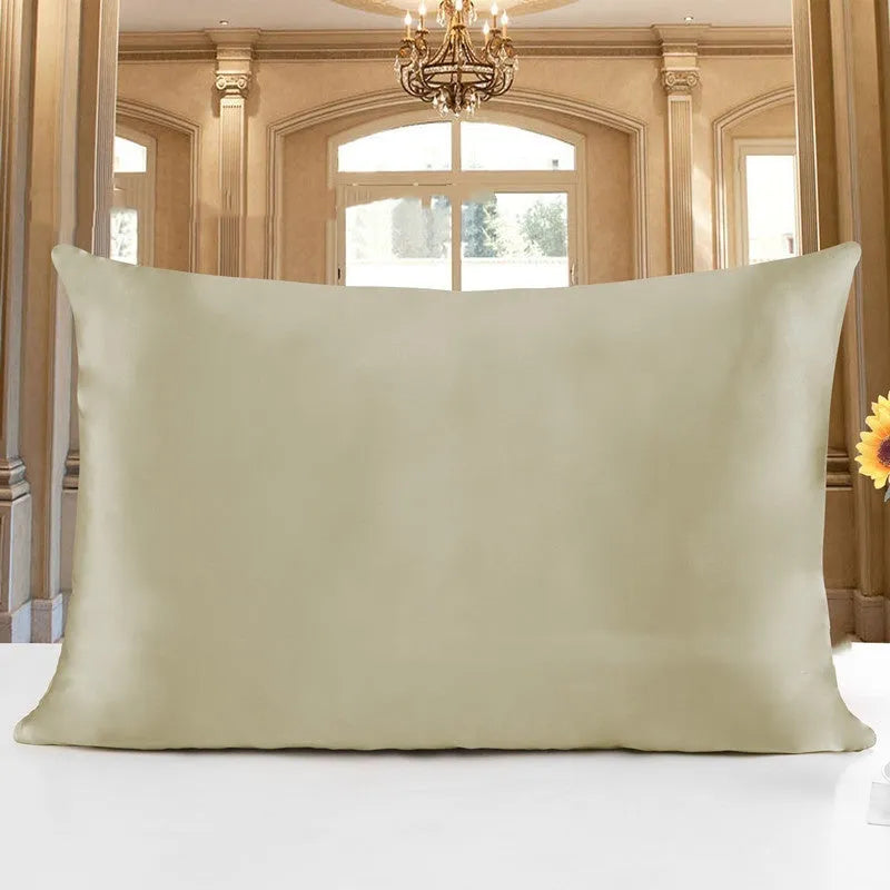 Double-sided silk pillowcase showing reversible design in apricot colour with three size options displayed