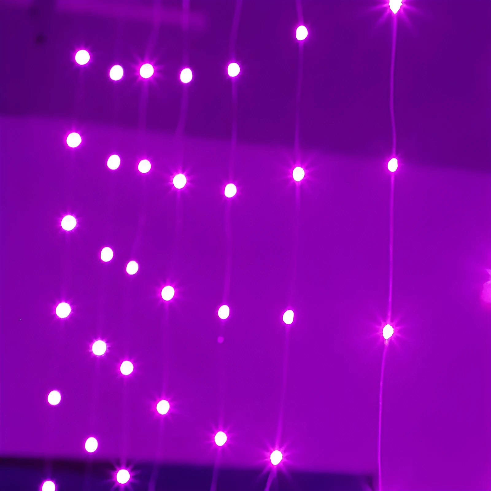 Copper curtain LED string lights with USB power cable in blue, purple, warm white, or white colour options