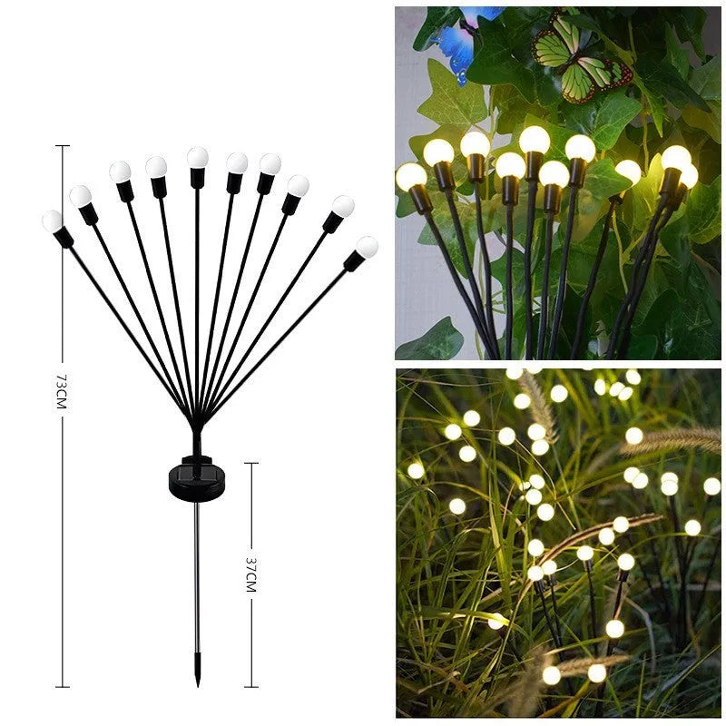 Solar-powered LED ground spike garden light with multiple heads and stainless steel soil plug.