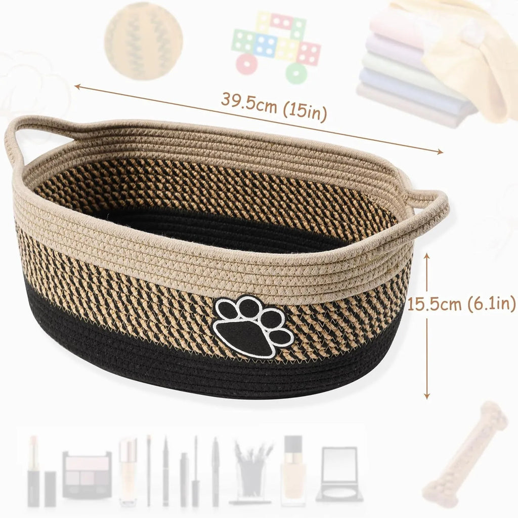 Small light beige handwoven cotton rope storage basket with a wooden handle.