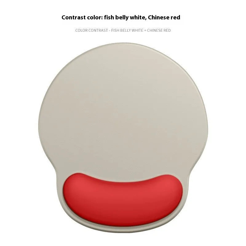 Silicone mouse mat with wrist rest in gradient colour pattern on desk