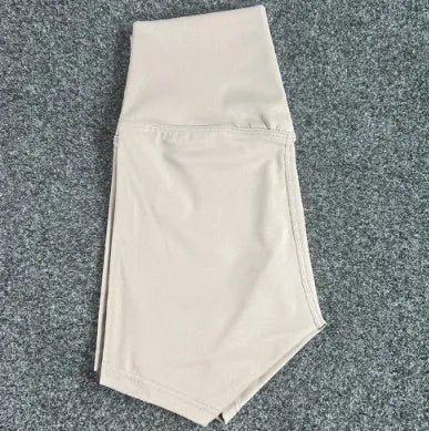 Women's high-waisted nylon yoga shorts in various colours suitable for running, sports, and cycling