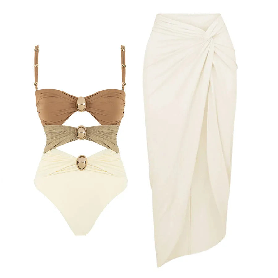 Women's solid colour one-piece swimsuit with gold buttons and matching skirt