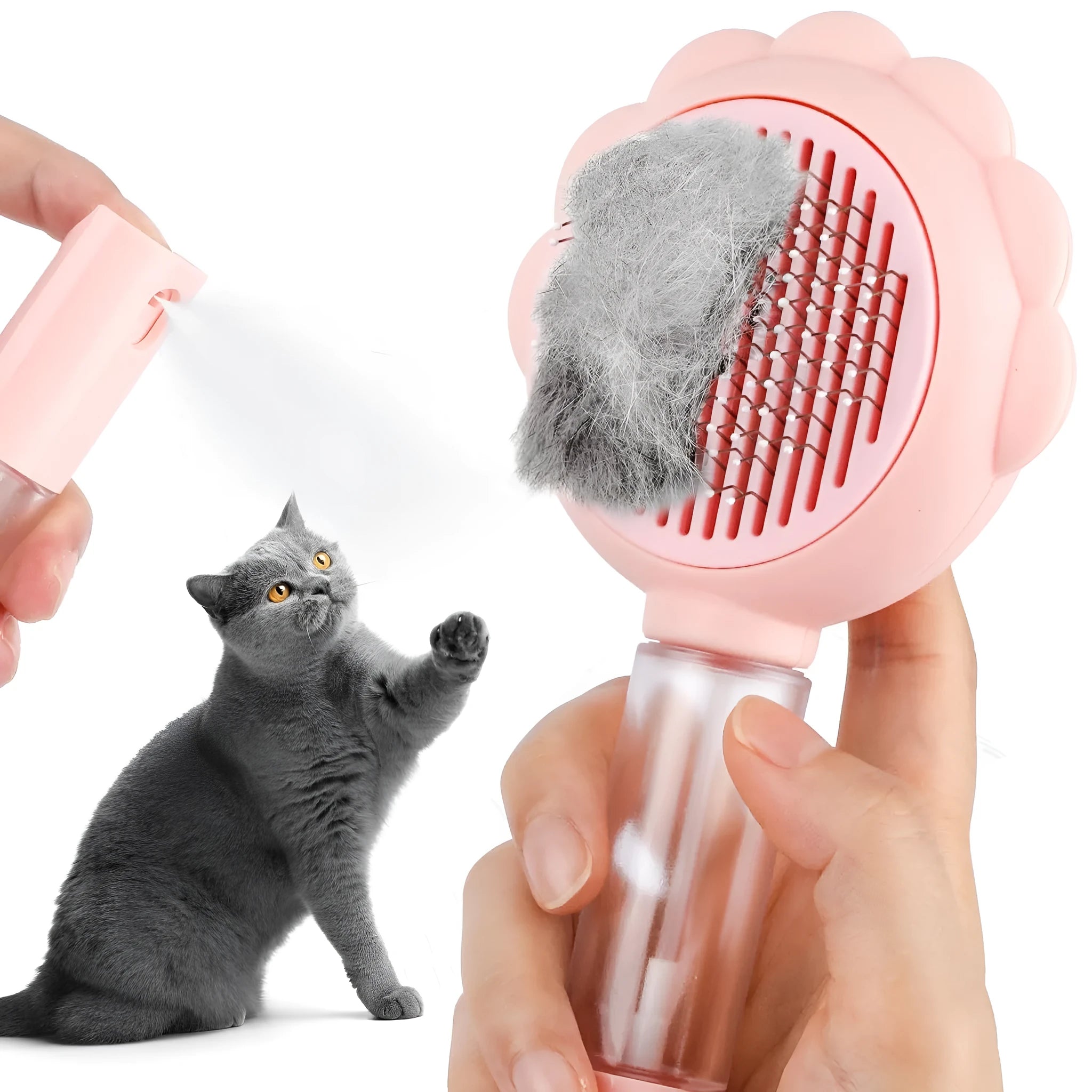 Grey spray cat brush with release button on a white background, showing the bristle head and spray nozzle.