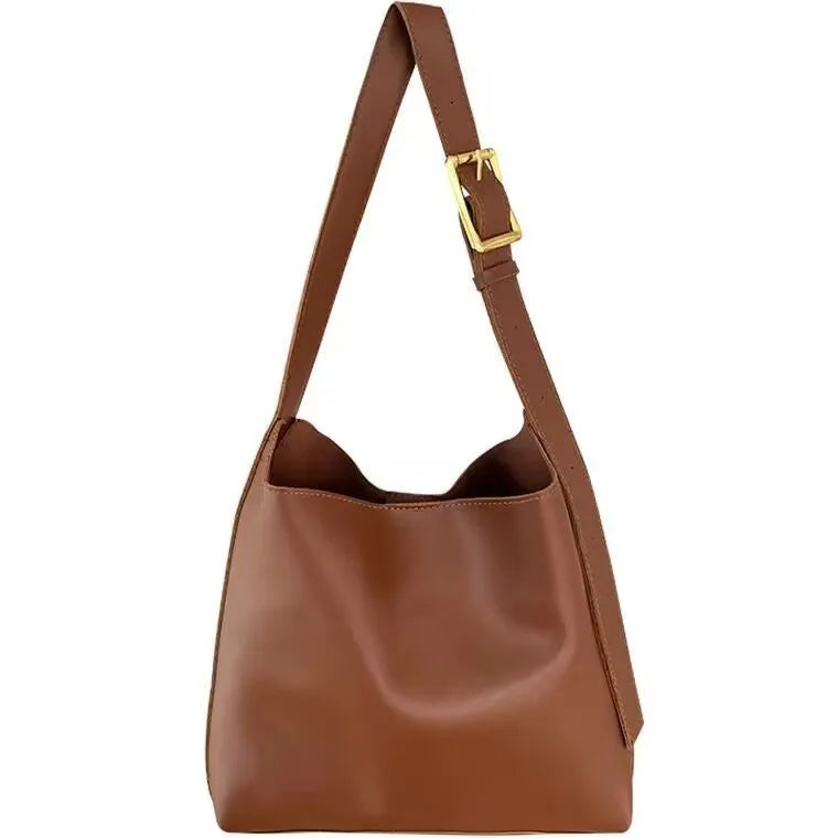 Women's soft PU leather shoulder bag with swing thread detailing in black or brown colour options