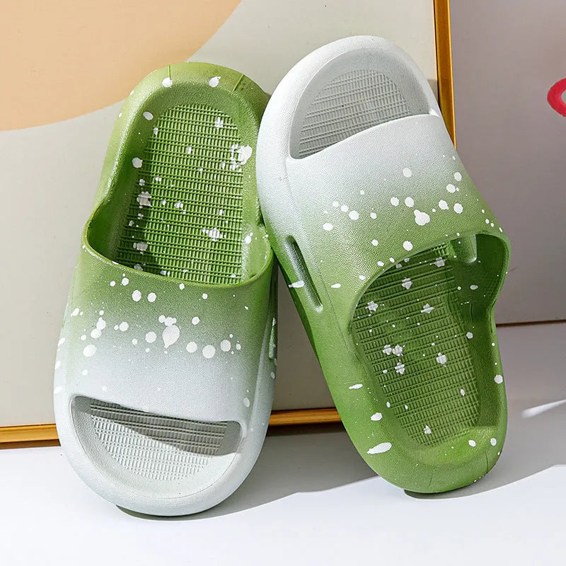 Gradient coloured children's PVC summer slippers with non-slip soles in blue, yellow, green, orange, pink, or black.