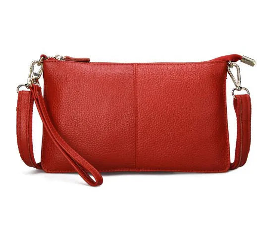 Lady cowhide slant bag in apricot showing top layer leather texture and dual straps
