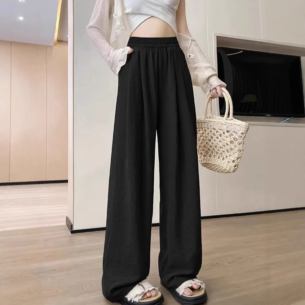 Casual high waist wide leg trousers in milky white, pleated front, loose fit design for women