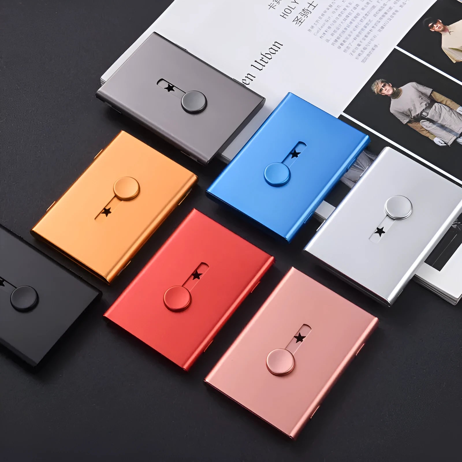 Hand push aluminium alloy RFID blocking business card case in black, 93x65x12mm, holding 6 cards