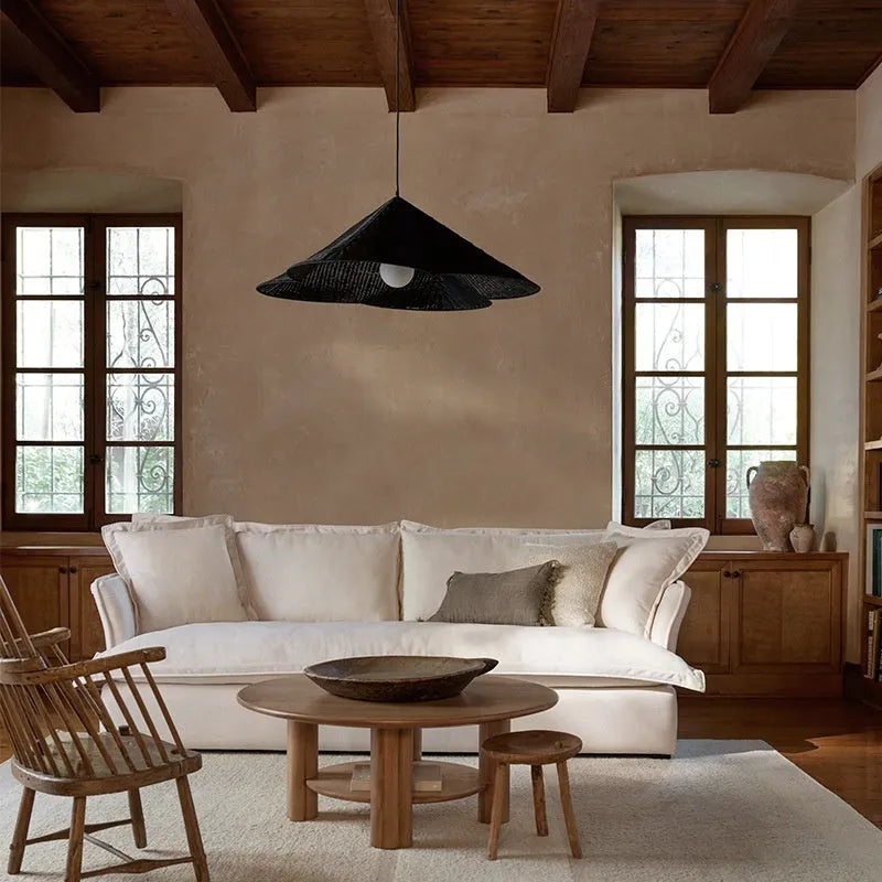 Silent Style natural rattan woven ceiling lamp with black metal trim in three diameter sizes.