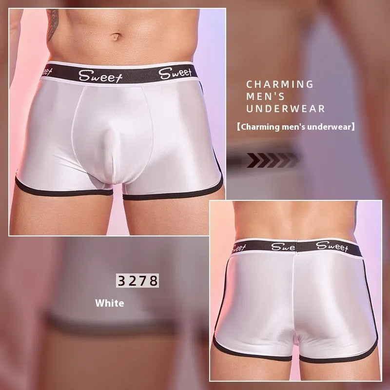 Men's silky nylon boxer shorts in black, white, and sapphire blue colours.
