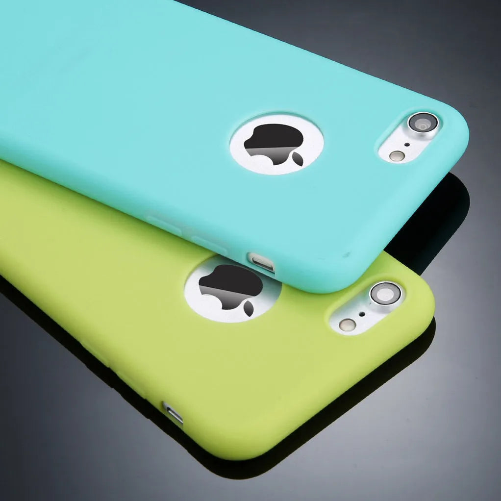 Candy colour soft silicon TPU back cover case for iPhone on a plain background.