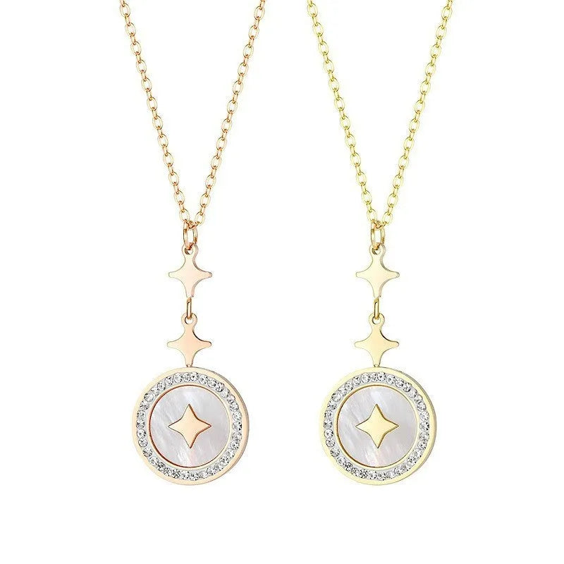 Gold titanium steel necklace with six-pointed geometric star pendant on an O-ring chain.