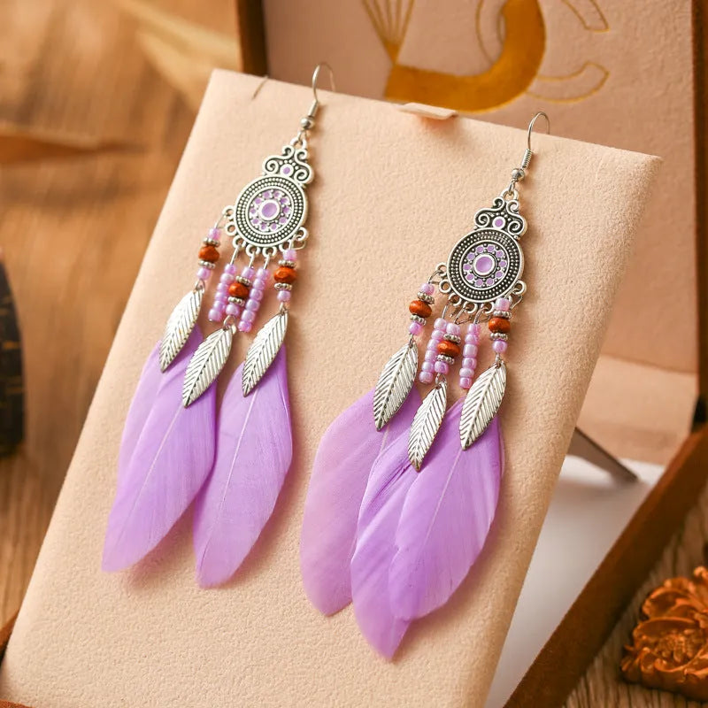 Round drop feather earrings with leaf detailing in various bohemian colours
