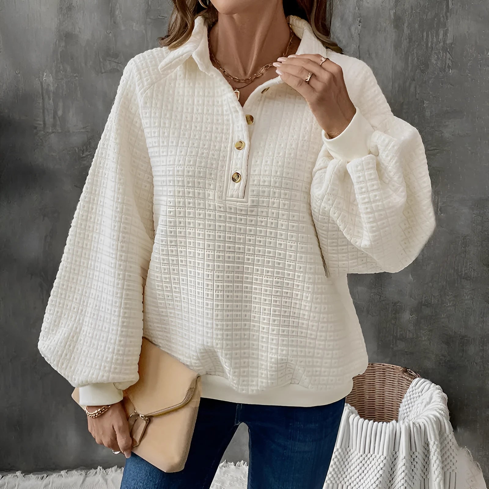 Women's solid colour thick sweater with a textured polo collar, shown in milky white.