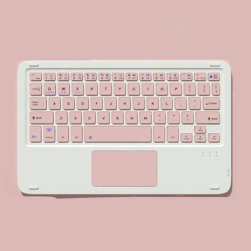 Pink wireless Bluetooth keyboard and mute mouse with USB charging cable on a desk