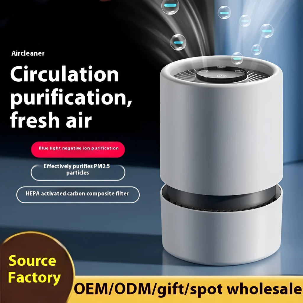 White EJ-JHQ101 desktop air purifier with USB cable on a wooden desk.