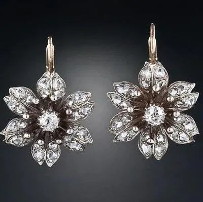 Women's retro fashion earrings in electroplated silver alloy with creative design elements