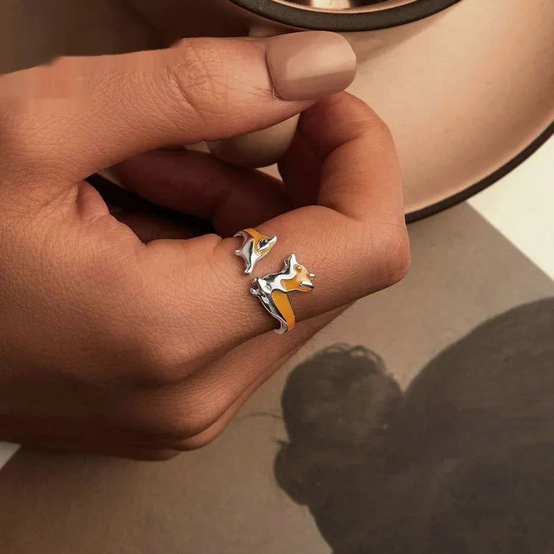 Silver electroplated fashion ring with a cute cartoon corgi dog design on it.