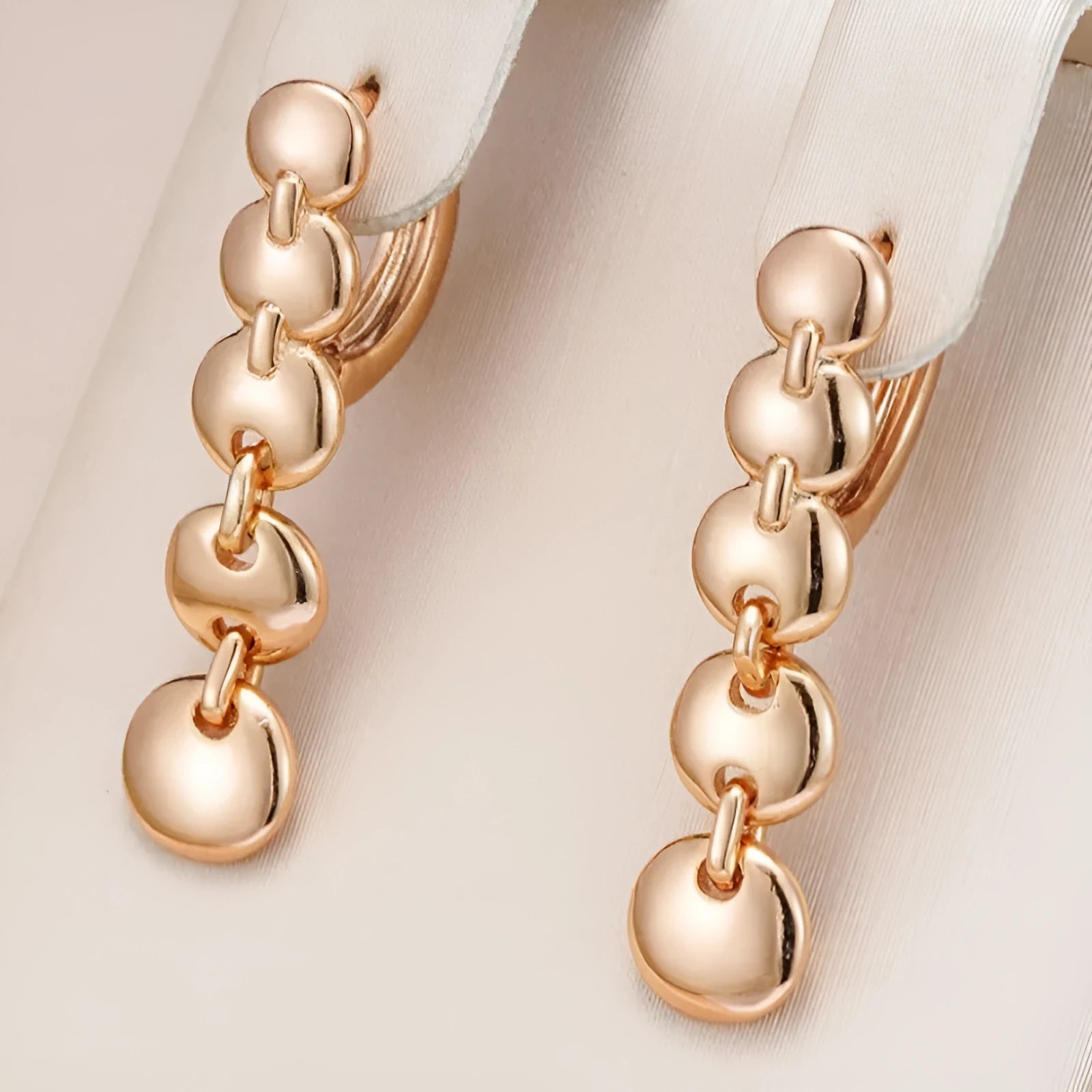 Gold retro woven hoop earrings showing full circle and textured copper surface