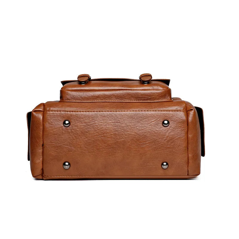 Vintage messenger bag with horizontal square design and contrast stitching in available colour options