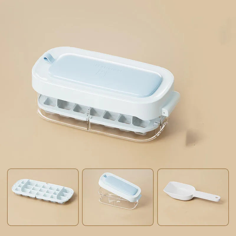 High-capacity ice cube tray in blue with leverage handle and integrated ice shovel storage compartment
