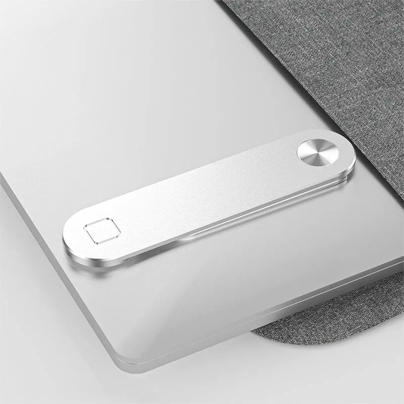 Black aluminium laptop phone holder with magnetic mount attached to laptop showing dual screen setup