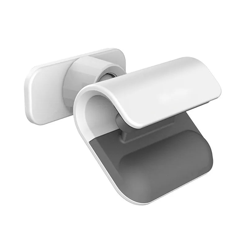 Black gravity car phone holder showing 360-degree rotation on a car dashboard