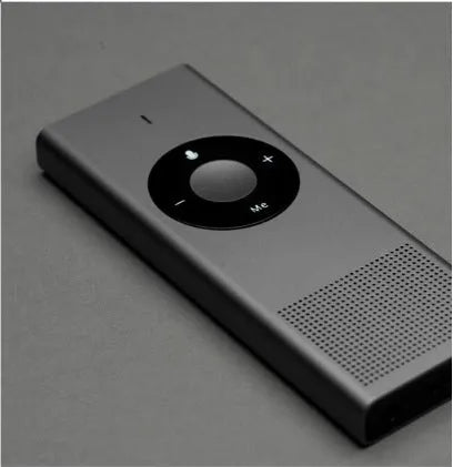 Xiaomi AI Translator portable voice translation device in Deep grey colour on a table