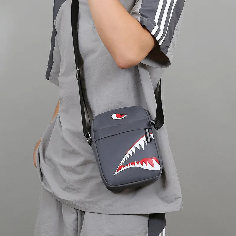 Men's small casual crossbody bag in Oxford cloth with animal print patterns in black colour option