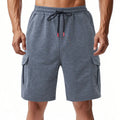 Man's loose fit multi-pocket cargo shorts in light grey heavy ring fabric.