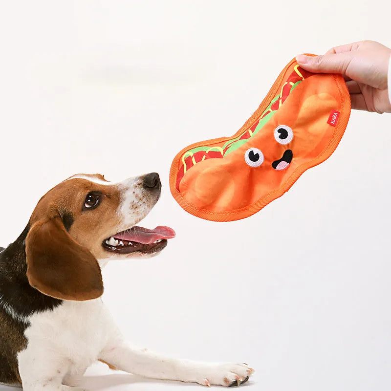 Crinkle and squeaky dog toy in hamburger, fries, hot dog, and pizza shapes.