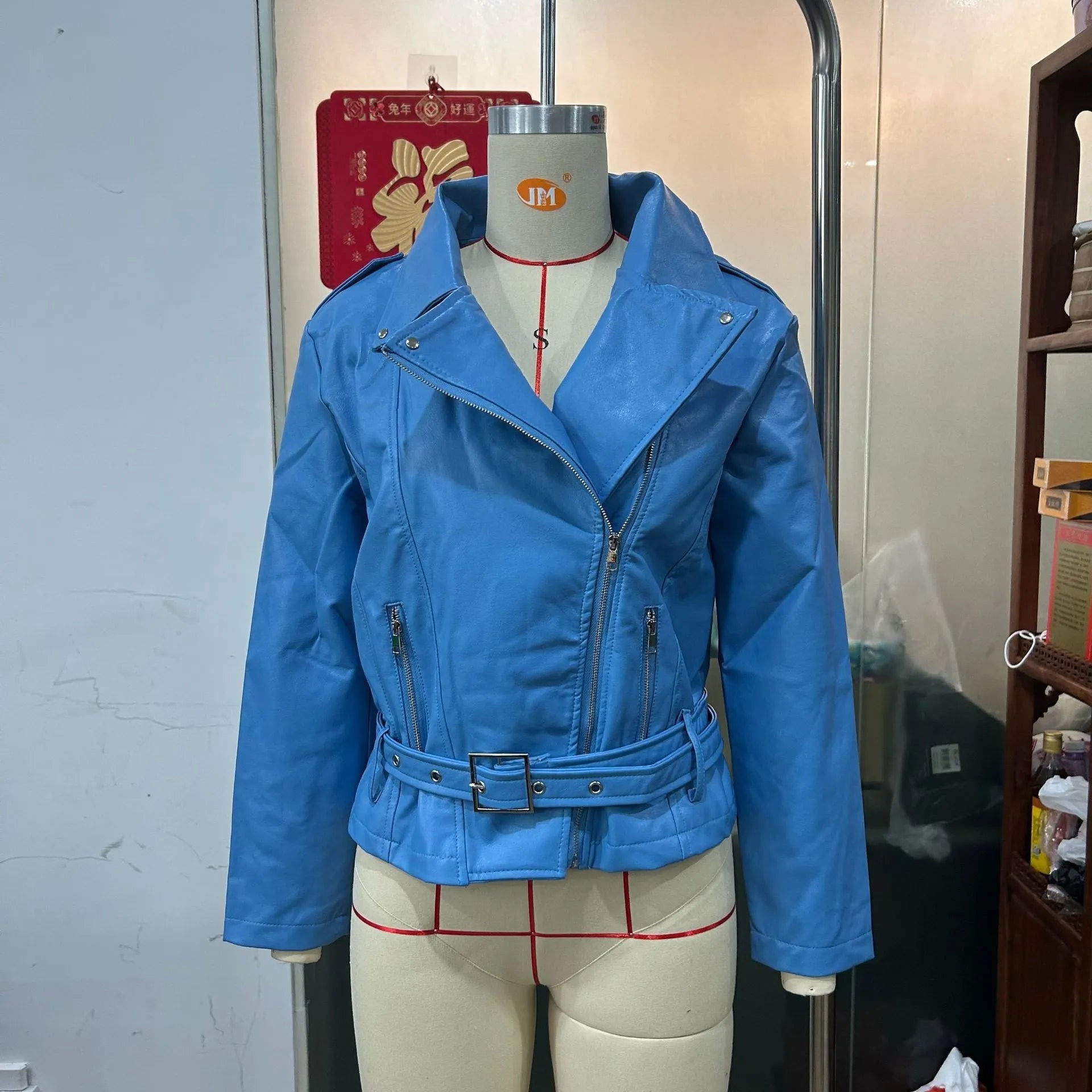 Punk style short jacket with a Peter Pan collar and drawstring waist in black, blue, or green.