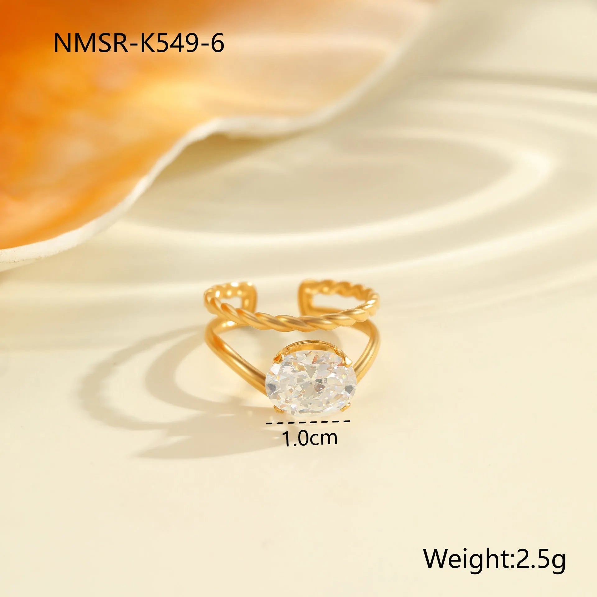 Open mouth geometric stainless steel ring with heart drop shape and gold inlaid zircon.