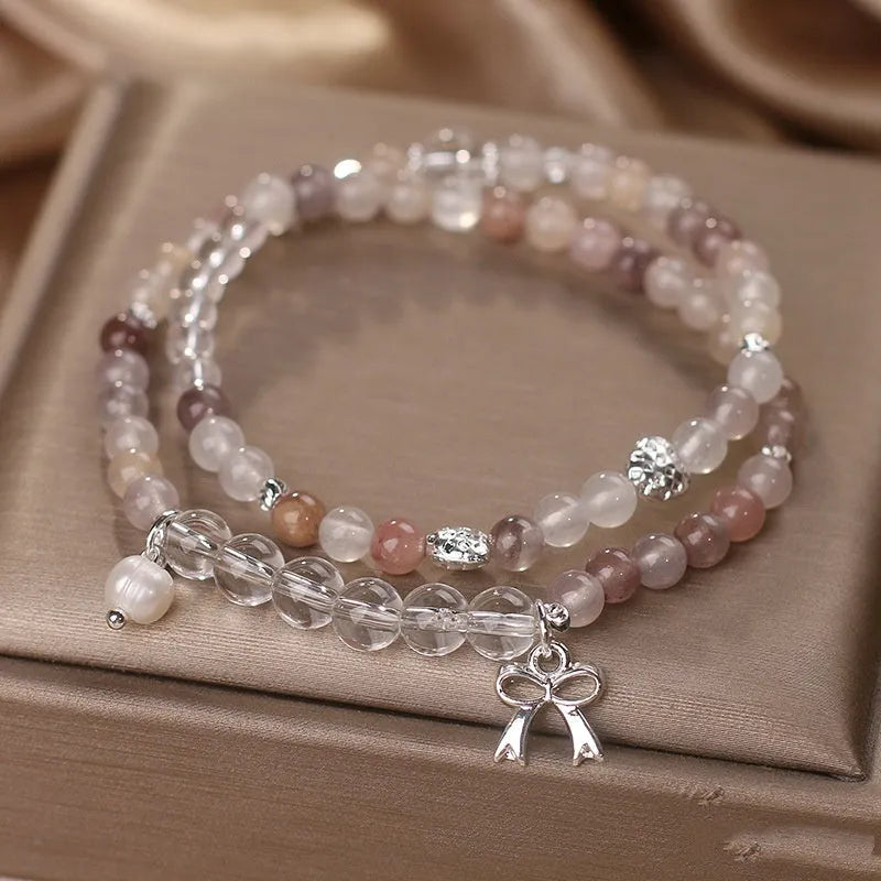 Chinese ancient style beaded butterfly bracelet on woman's wrist