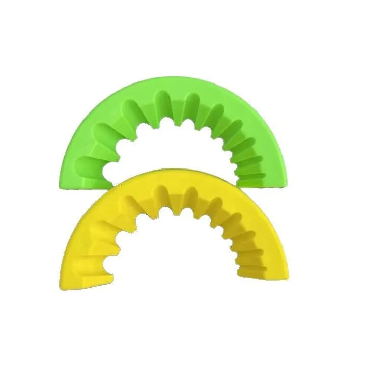 Yellow, green, and black plastic angle grinder bracket holder for sealant cartridges.
