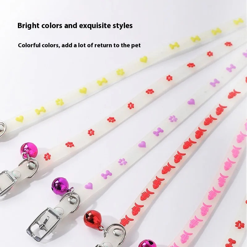 Glow in the dark cat collar with adjustable chain in paw print, love, fishbone, or footprint design.