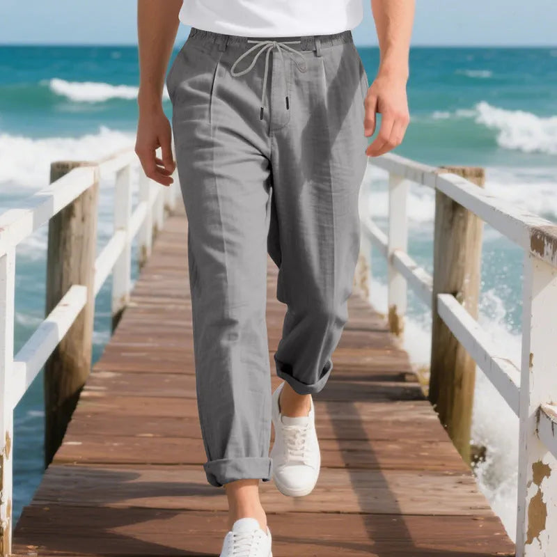 Men's casual linen trousers in light khaki colour with drawstring waist and straight leg