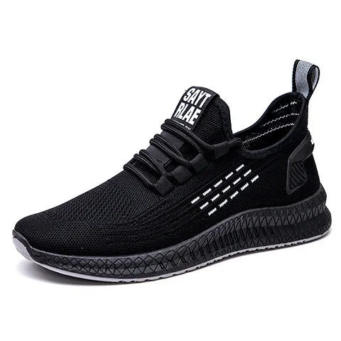 Men's black casual trainers with cross-strap design over striped pattern and Flying Weave fabric upper