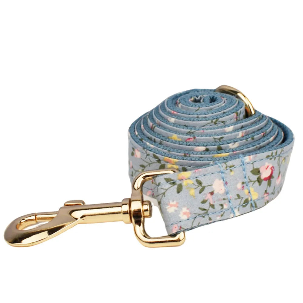 Blue floral polyester cotton dog collar set with leash, vest, bow, and poop bag in sizes XS to XL