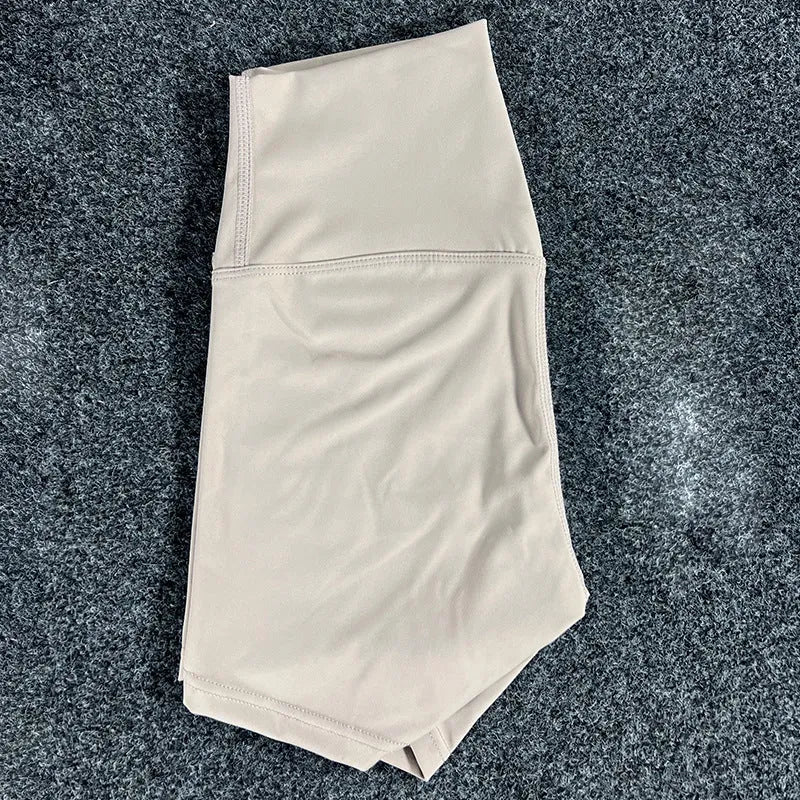 Women's high-waisted nylon yoga shorts in various colours suitable for running, sports, and cycling