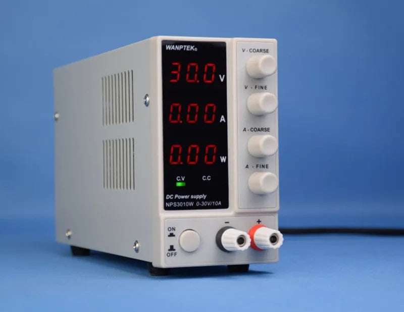 White adjustable DC bench power supply with display, model S605W, for electronics testing.