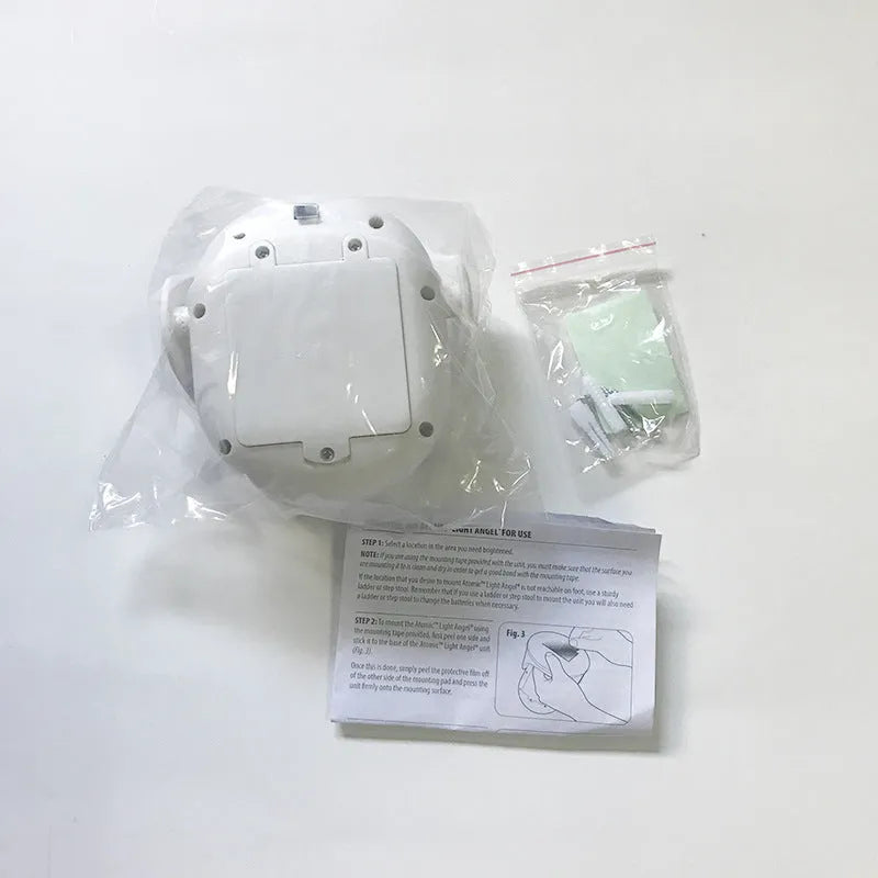 White Atomic Angel induction wall light with ABS plastic housing