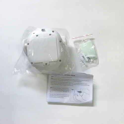 White Atomic Angel induction wall light with ABS plastic housing
