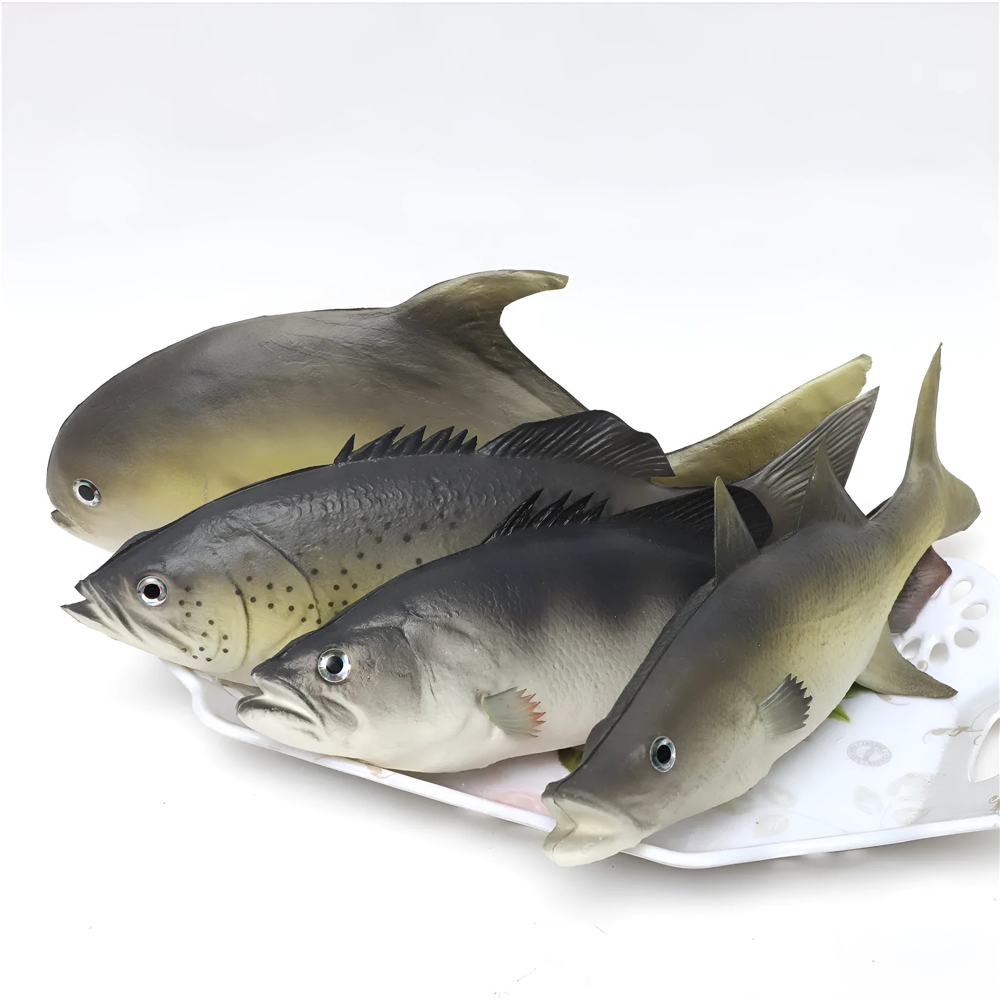 Three PU simulated fish ornaments including yellow-fin tuna and small tuna marine models